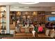 Upscale bar with ample seating and decor provides a relaxed social atmosphere at 14501 Grove Resort Ave # 3601, Winter Garden, FL 34787