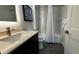 Contemporary bathroom with sleek fixtures, a stylish sink, and shower-tub combination at 14501 Grove Resort Ave # 3601, Winter Garden, FL 34787