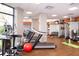 Bright gym with a variety of modern cardio and weight training equipment at 14501 Grove Resort Ave # 3601, Winter Garden, FL 34787