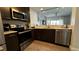 Well-equipped kitchen features stainless steel appliances and a breakfast bar at 14501 Grove Resort Ave # 3601, Winter Garden, FL 34787