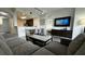 Open-concept living room connected to the dining area and kitchen at 14501 Grove Resort Ave # 3601, Winter Garden, FL 34787