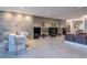 Business center features a stone accent wall and modern work spaces at 14501 Grove Resort Ave # 3601, Winter Garden, FL 34787