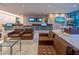 Comfortable lobby with contemporary seating and multiple information screens at 14501 Grove Resort Ave # 3601, Winter Garden, FL 34787