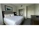 Comfortable main bedroom with a large bed, closet, and ample storage space at 14501 Grove Resort Ave # 3601, Winter Garden, FL 34787