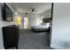 Spacious main bedroom featuring a comfortable king-size bed, ceiling fan and TV at 14501 Grove Resort Ave # 3601, Winter Garden, FL 34787