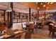 Elegant restaurant featuring well-appointed tables, contemporary lighting, and modern design elements for a fine dining experience at 14501 Grove Resort Ave # 3601, Winter Garden, FL 34787