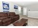 Entertaining bonus room with comfortable seating at 15216 Langsdale Ct, Mascotte, FL 34753