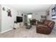 Entertaining bonus room with TV, and game memorabilia at 15216 Langsdale Ct, Mascotte, FL 34753