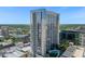Stunning high-rise condominium showcasing modern architecture, a pool, and city views at 155 S Court Ave # 1613, Orlando, FL 32801