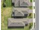 Aerial view showing roof features of the house and the surrounding neighborhood at 17398 Saw Palmetto Ave, Clermont, FL 34714