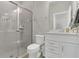 Modern bathroom with a glass-enclosed shower and contemporary vanity at 17398 Saw Palmetto Ave, Clermont, FL 34714