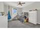 bedroom with a loft bed, slide, and fun decor at 17398 Saw Palmetto Ave, Clermont, FL 34714