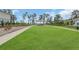 Community park featuring picnic shelter, playground, and ample green space at 17398 Saw Palmetto Ave, Clermont, FL 34714