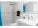 Modern bathroom with decorative mosaic tile, sleek gray vanity, and a stylish sink with updated fixtures at 1836 N Crystal Lake Dr # 104, Lakeland, FL 33801