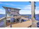 Dock and boathouse overlooking the serene lake at 18951 Lake Pickett Rd, Orlando, FL 32820