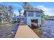 Waterfront property featuring a dock and boathouse at 18951 Lake Pickett Rd, Orlando, FL 32820