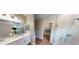 Well-lit bathroom features double vanity sinks, a walk-in shower, and modern fixtures at 2050 1St Ave, Deland, FL 32724
