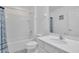 Well-lit bathroom with a shower-tub, toilet, and white vanity at 2136 Crofton Ave, Davenport, FL 33837