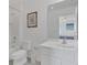 Clean bathroom with a white vanity, toilet, and tub/shower combo at 2136 Crofton Ave, Davenport, FL 33837