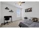 Modern bedroom with a study area, sleek desk and decor at 2136 Crofton Ave, Davenport, FL 33837