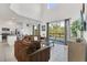 Open-concept living area with access to the pool area, perfect for entertaining and relaxing at 2136 Crofton Ave, Davenport, FL 33837