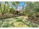 Exterior backyard showing the lawn and home at 220 Wekiva Park Drive, Sanford, FL 32771