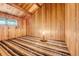 Bedroom with wood paneling and large windows at 220 Wekiva Park Drive, Sanford, FL 32771
