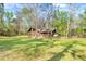Exterior shot showing the home and front lawn at 220 Wekiva Park Drive, Sanford, FL 32771