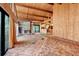 Spacious living room with stone fireplace, vaulted ceilings, and unique wooden architecture at 220 Wekiva Park Drive, Sanford, FL 32771