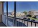 Balcony view overlooks the parking lot, building, and river beyond at 225 W Seminole Blvd # 213, Sanford, FL 32771