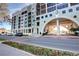 An exterior view of the condo building, and the architectural details of the facade at 225 W Seminole Blvd # 213, Sanford, FL 32771