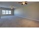Expansive living room with carpet, large windows, and ceiling fans at 225 W Seminole Blvd # 213, Sanford, FL 32771