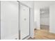 Bathroom featuring a glass-enclosed shower and wood-look tile at 2917 Wild Olive Dr, St Cloud, FL 34772