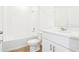 Clean bathroom featuring a shower, tub, toilet, and vanity with modern fixtures at 2917 Wild Olive Dr, St Cloud, FL 34772