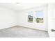 Bedroom with carpet and bright, natural light from two large windows at 2917 Wild Olive Dr, St Cloud, FL 34772