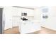 Bright kitchen with white cabinetry, stainless steel appliances, and island at 2917 Wild Olive Dr, St Cloud, FL 34772