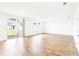 Spacious living room with sliding doors to the backyard and wood-look tile flooring at 2917 Wild Olive Dr, St Cloud, FL 34772