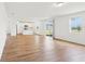 Bright living area with wood-look tile flooring and sliding glass doors to the backyard at 2917 Wild Olive Dr, St Cloud, FL 34772