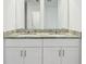 Bathroom featuring double sinks with granite countertop at 2925 Wild Olive Dr, St Cloud, FL 34772