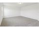 Bright bedroom featuring neutral carpet and overhead lighting at 2925 Wild Olive Dr, St Cloud, FL 34772
