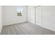 Bedroom with carpet, closet, a window for natural light, and neutral walls at 2925 Wild Olive Dr, St Cloud, FL 34772