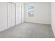 Clean bedroom with a bright window and a closet for organized storage at 2925 Wild Olive Dr, St Cloud, FL 34772