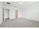 Clean and spacious bedroom with neutral carpet and ample closet space at 2929 Wild Olive Dr, St Cloud, FL 34772