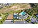 Overhead view of a community amenity center featuring a pool and playground at 3347 Hanging Tide St, Winter Garden, FL 34787