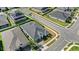 Aerial view of a home with a well-maintained lawn and charming landscaping in a neighborhood setting at 3347 Hanging Tide St, Winter Garden, FL 34787