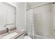 Bathroom with shower and tub combo, single vanity, and contemporary fixtures at 3347 Hanging Tide St, Winter Garden, FL 34787