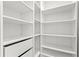 A custom closet shelving system provides ample storage and organization at 3347 Hanging Tide St, Winter Garden, FL 34787