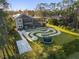 Aerial view of home with landscaped backyard and pool enclosure at 4205 Clarice Ct, Windermere, FL 34786