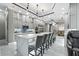 Expansive kitchen featuring a waterfall island and barstool seating at 4205 Clarice Ct, Windermere, FL 34786