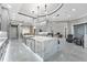 Open-concept kitchen with a large central island and pendant lighting at 4205 Clarice Ct, Windermere, FL 34786